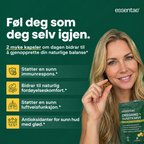 Kvinne med to kapsler og en pose oregano og svartkarve.